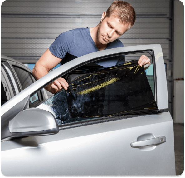 A car with 3M automotive window tint applied to its side windows