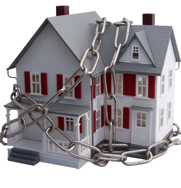 Model of a two-storey house wrapped in a heavy steel chain